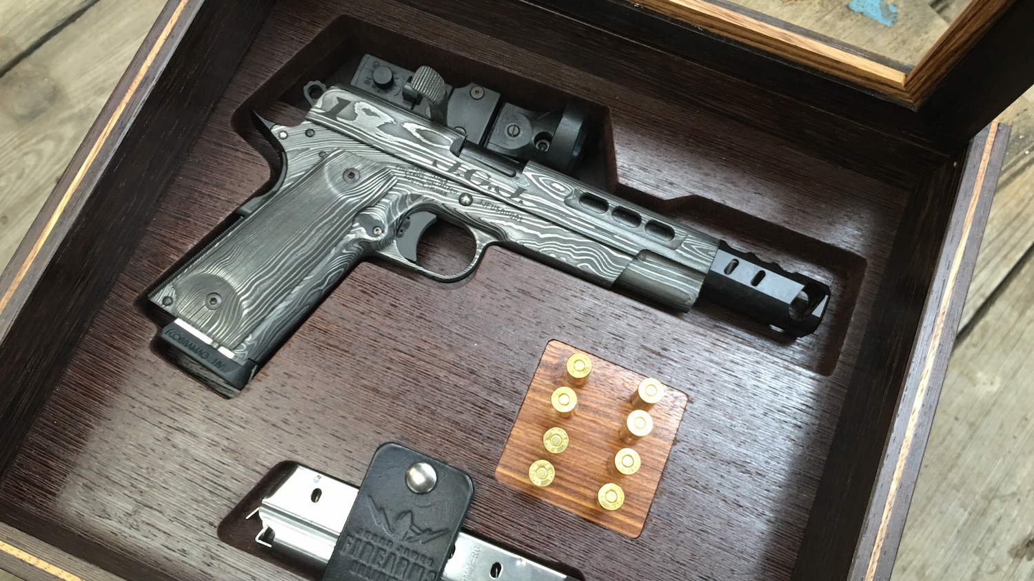 Jesse James Donates First of Rare Damascus 1911s to NRA Museums