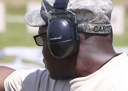 Sgt. Carter takes aim while temporarily assigned to the US Army Marksmanship Unit for the Pistol Championships at Camp Perry