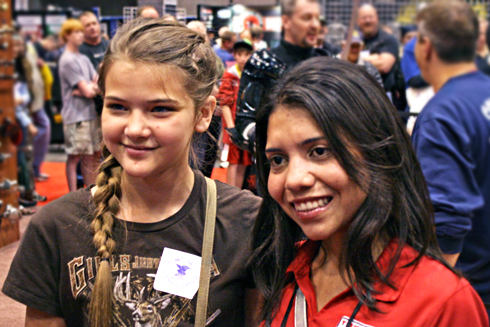 Top Shot's Gabby Franco poses with a fan at the NRA Convention in St. Louis